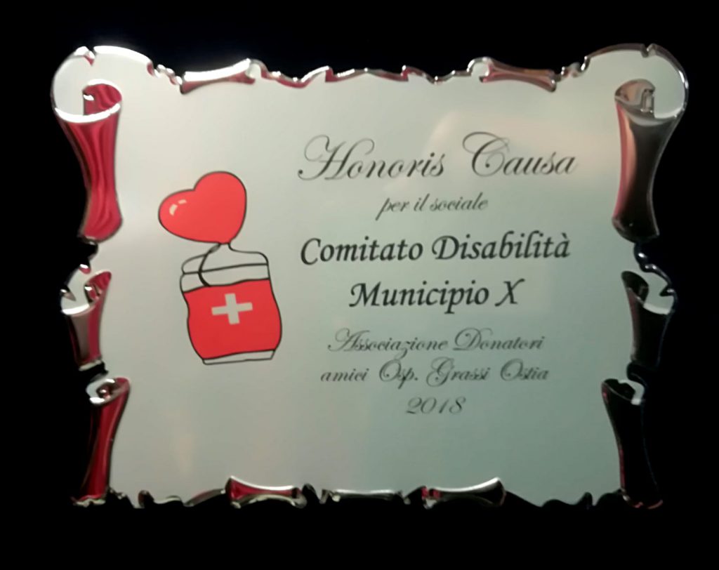 premio honoris causa per il sociale da parte dell'associazione donatori ospedale grassi